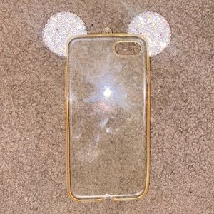 IPhone S phone case with glittery mini mouse ears.